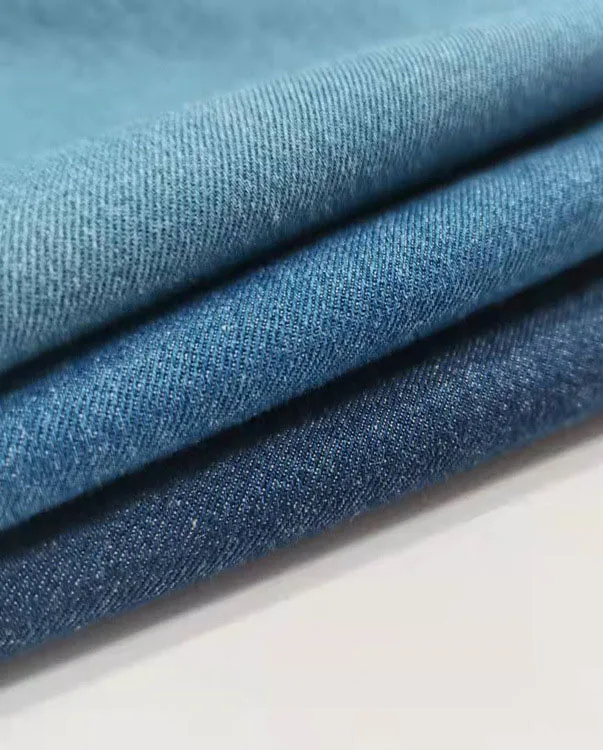 Popular strech denim fabric raw tela woven denim fabric manufacturers