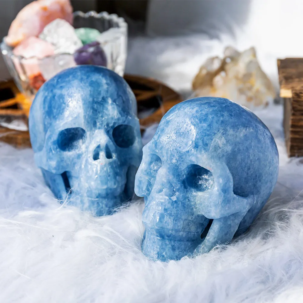 Wholesale natural high quality healing hand craved blue calcite crystal skulls crafts for home decoration