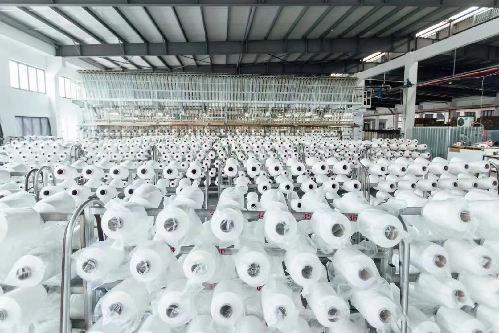 302 303 RSP Raw White 100% Recycled Staple Spun Polyester Sewing Yarn