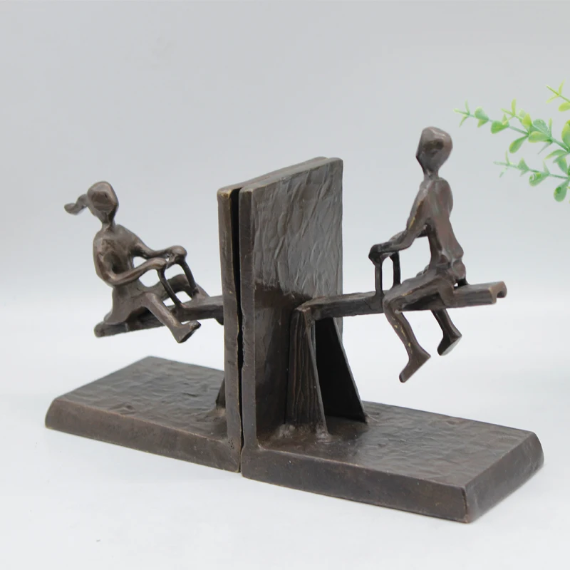 Cast iron sculpture children playing with seesaw bookends figurine For Decor