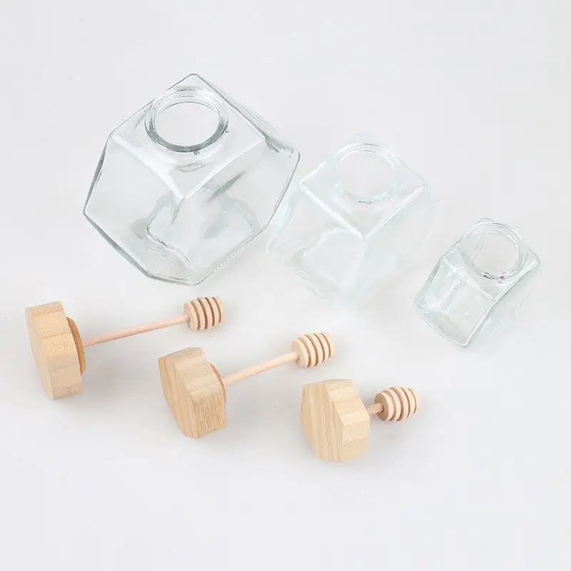 Wholesale 100ml 220ml 380ml Unique Hexagonal Glass Bottle Jar  For Honey with Wooden Lids and Dipper