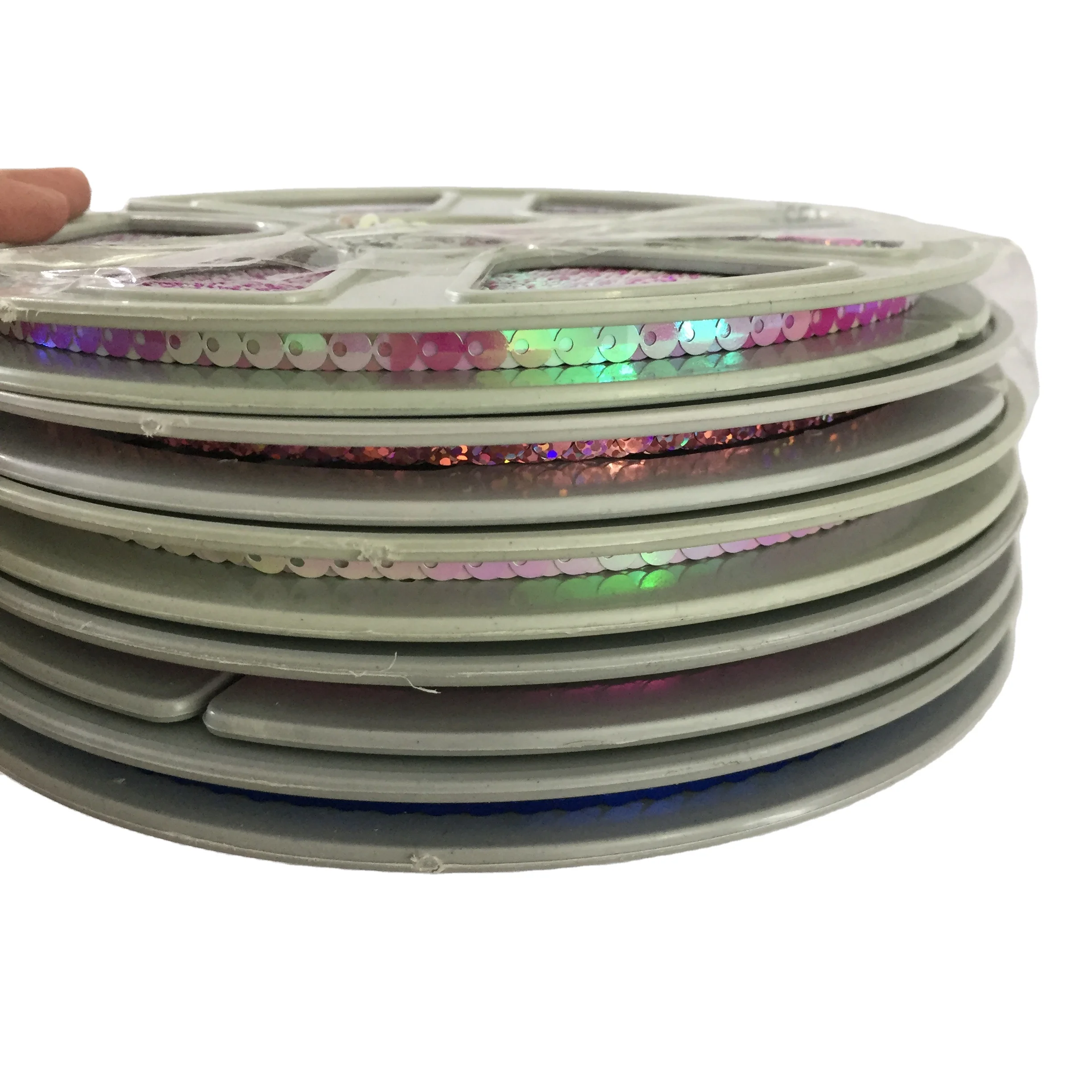 Chinese factory direct sale PET sequin disc sequin reel for sale with centre and side hole