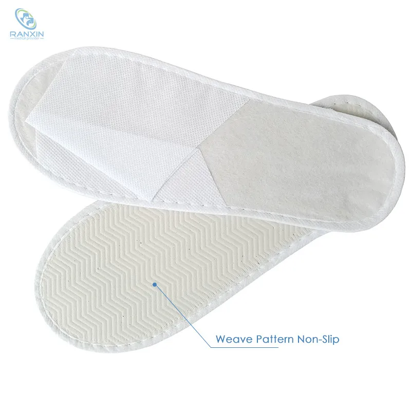 Non woven slippers for hotel spa sauna use soft anti skip disposable slipper for massage daily use indoor slippers