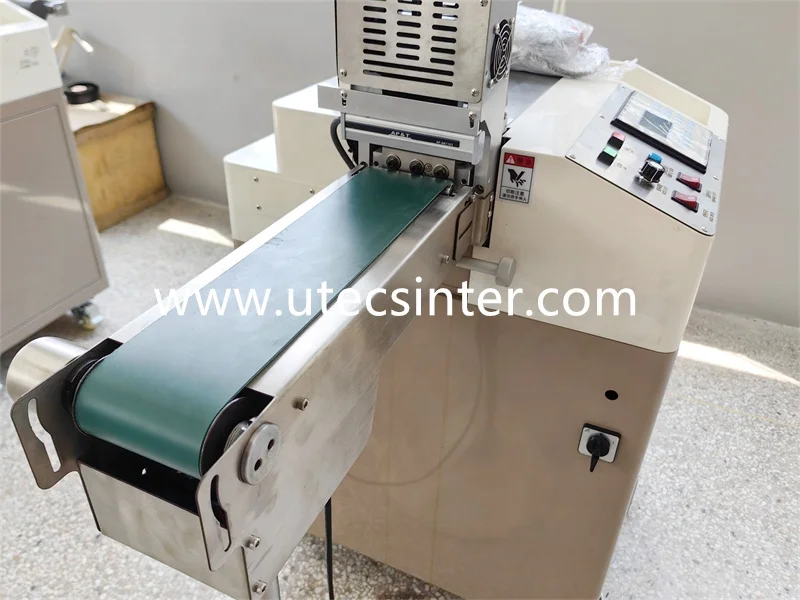 UGS2080 High Speed Ultrasonic Garment Wash Care RIbbon label Cutter with Belt Conveyor Stacker