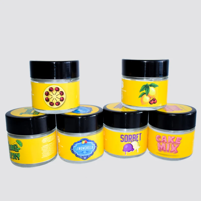 
Custom Design Food Clear Round Glass Jar For Weeds Herbs Skin Cream Bottle With Black Lid 2 Oz 