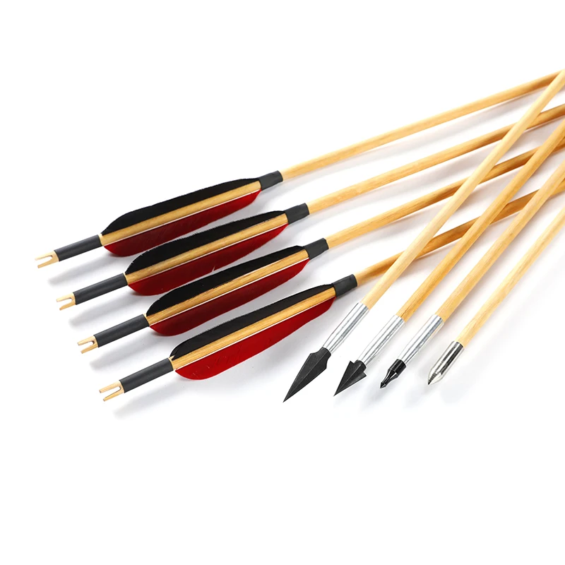 wooden arrow with turkey feather for traditional archery bow hunting and shooting