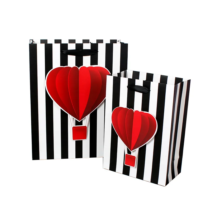 Christmas gift packaging eco custom logo printed shopping handle black white stripe Art Cardboard Paper Bags for gift clothes