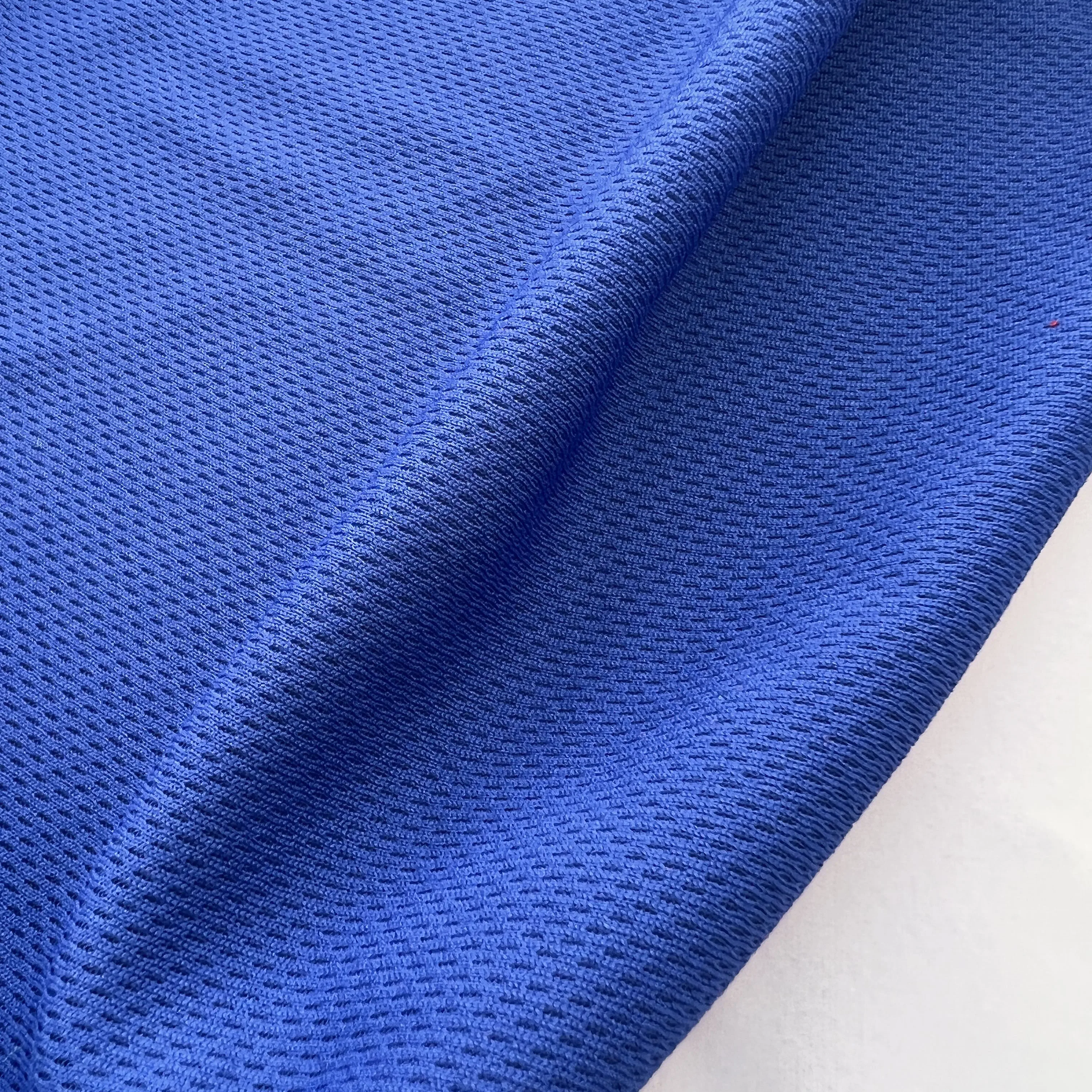 Wholesale High Quality Navy Blue 100% Polyester Mesh Bird Eye Fabric Fluorescent