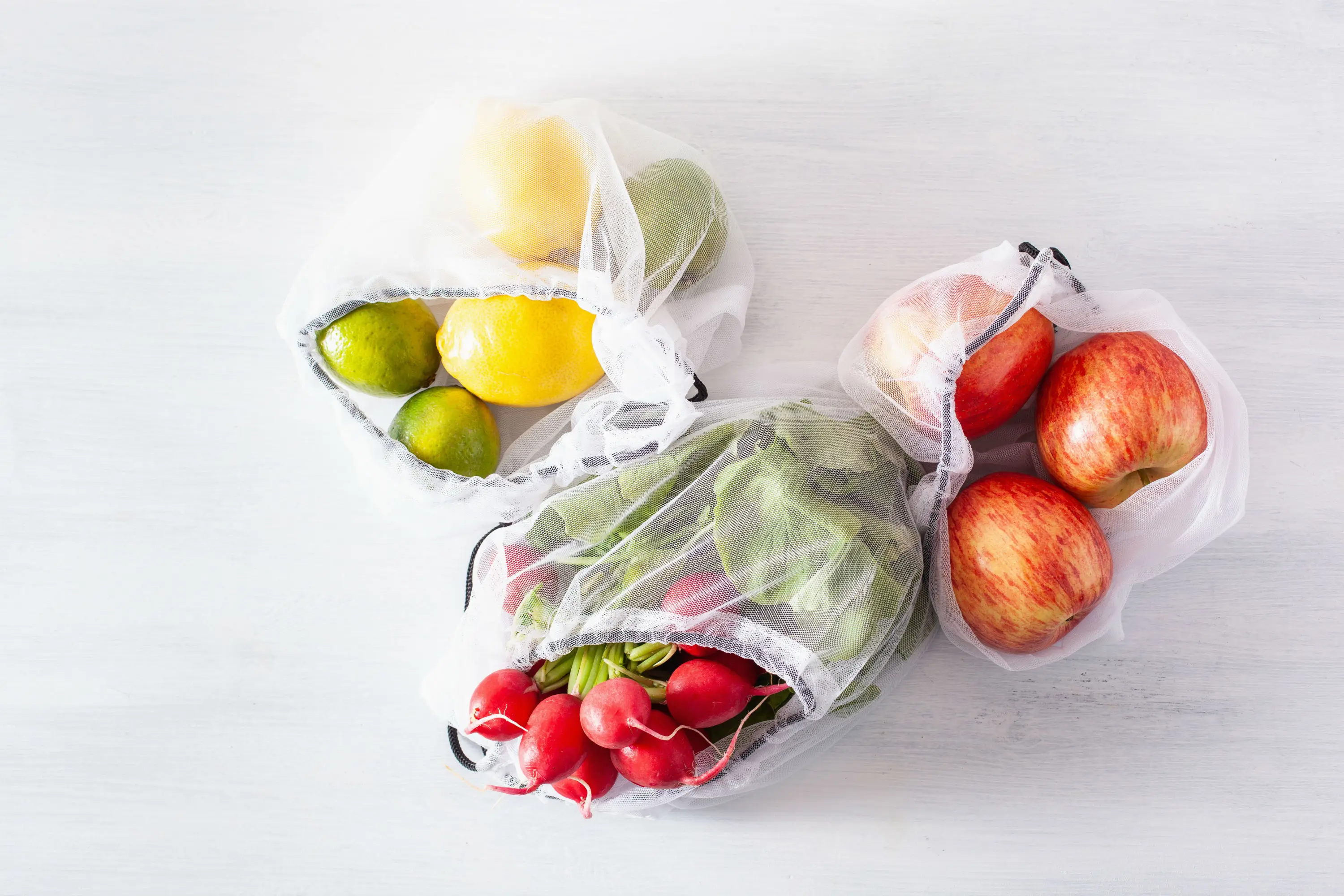 
New custom logo fruit vegetable shopping net mesh bags for packaging food storage 
