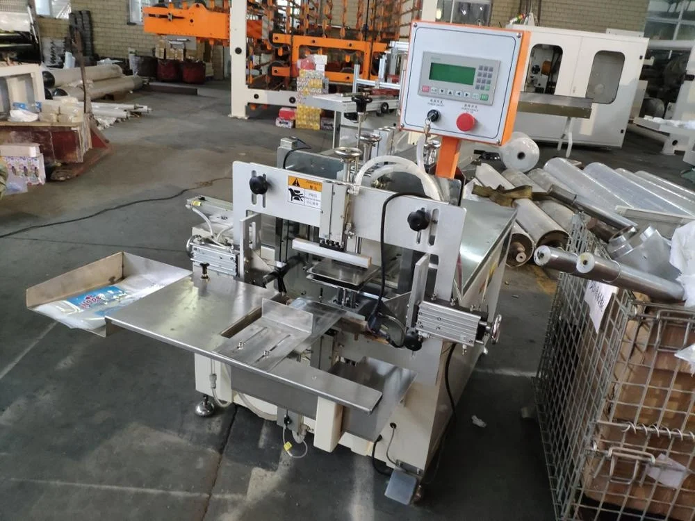 
Best Selling Semi Automatic Napkin Tissue Paper Packing Machine 