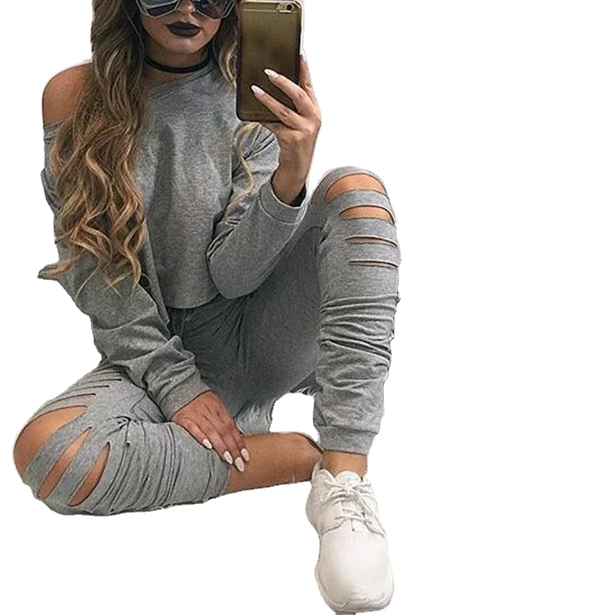 2021Fashion autumn and winter European and American new hole burning flower long sleeve solid color casual two-piece suit