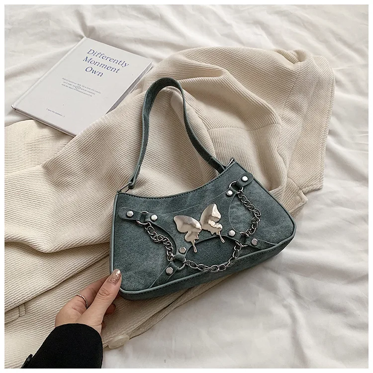2024 best-selling wholesale mini exquisite bow chain handbag motorcycle street photo women shoulder saddle bag sweet cool style
