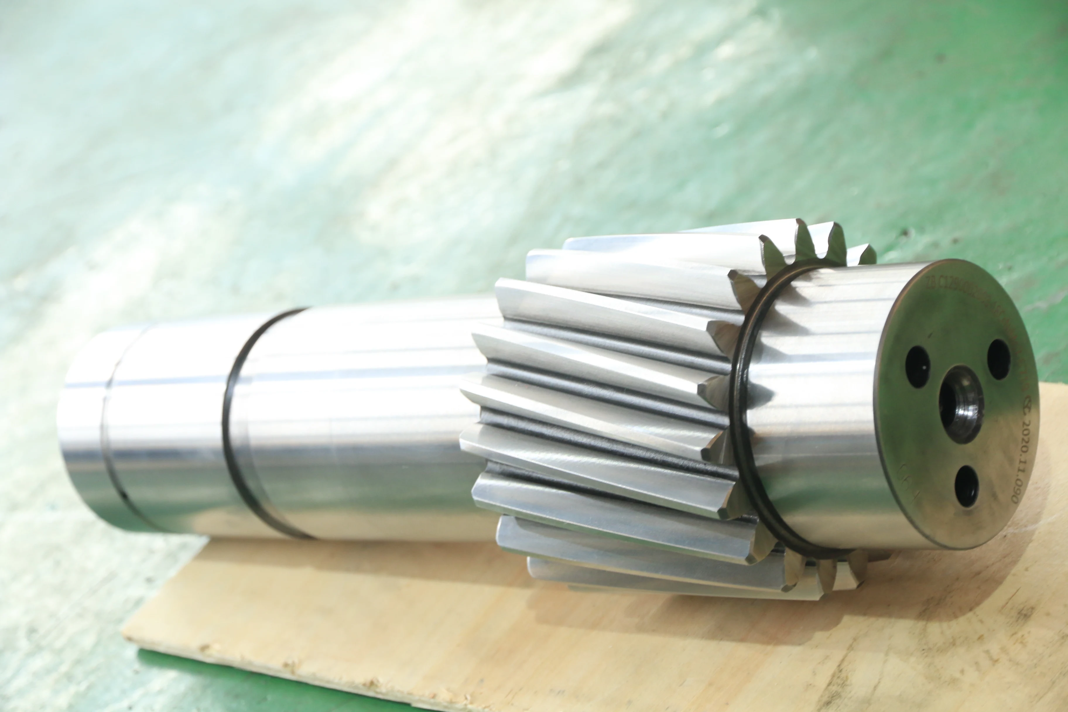 
Grinding helical gear and shaft for agricultural machinery 