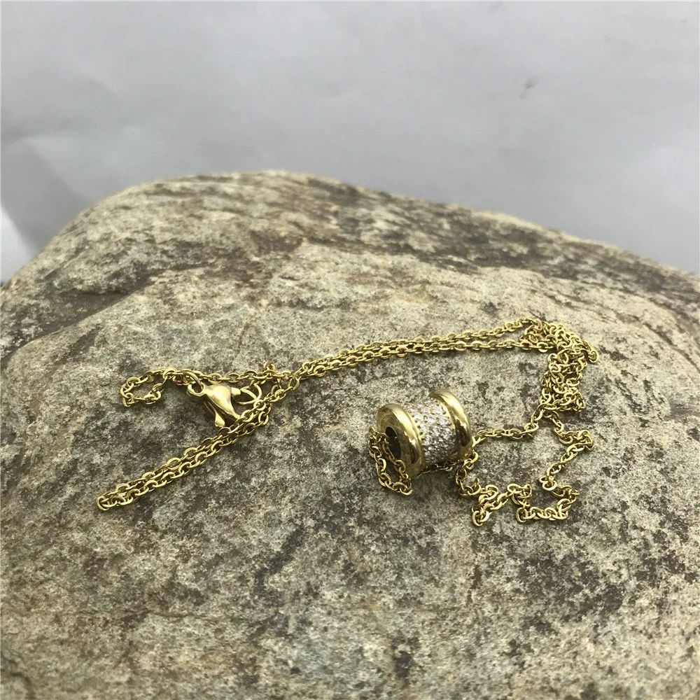 2022 creativity stainless steel luck eye pave zirconia gold palm charm pendant necklace for men and women