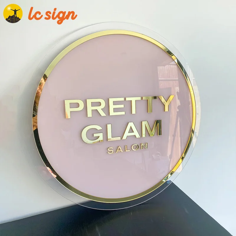 Acrylic white logo with LED light. Golden mirror letters, business signs for beauty salon, boutique, barber shop