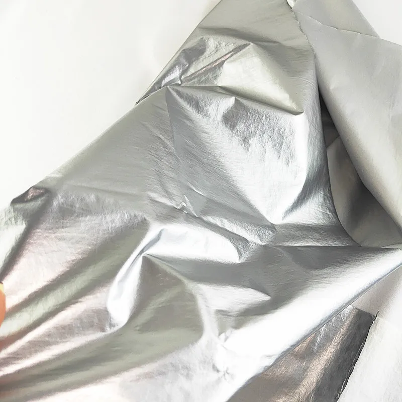 Серебристая ПУ покрытая искусственная кожа нейлон пухозащищенная куртка ткань