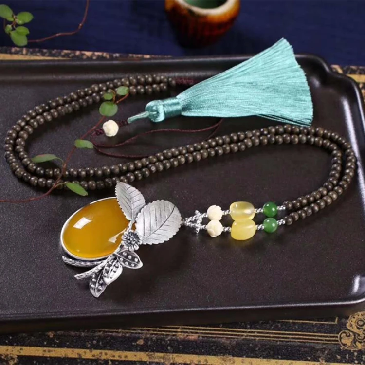 
Kalimantan agilawood beads necklace Thai silver natural canary stone pendant necklace new model necklace 