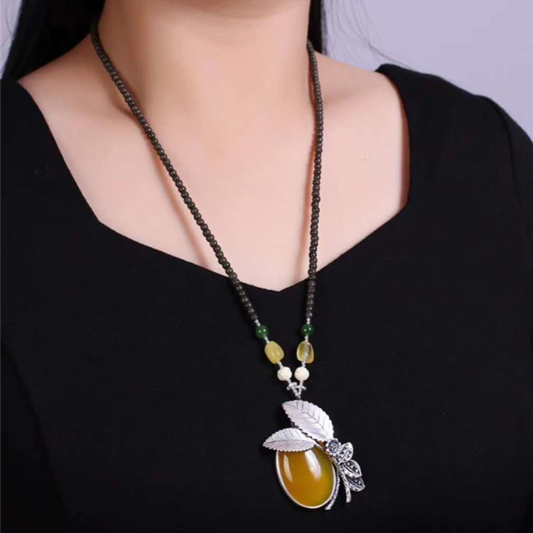 
Kalimantan agilawood beads necklace Thai silver natural canary stone pendant necklace new model necklace 
