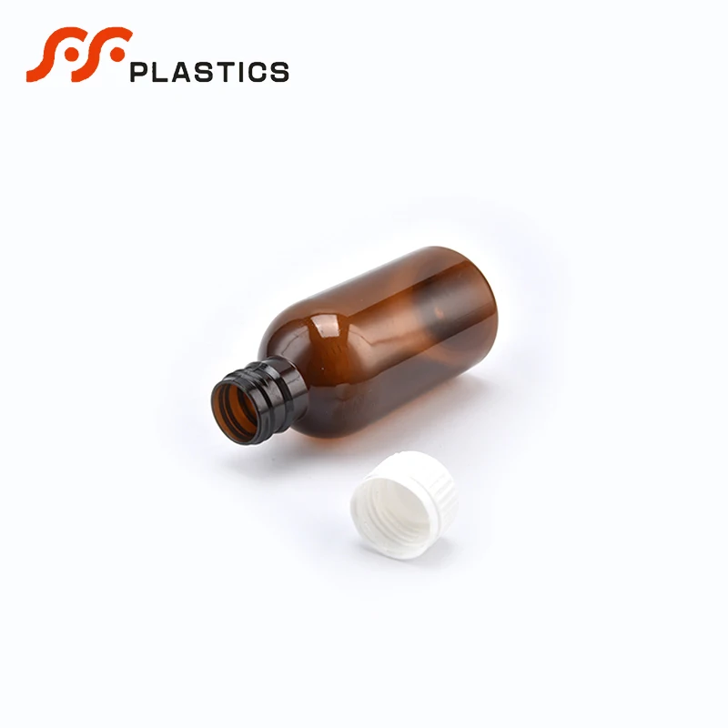 Food grade medical safe seal liquid packaging amber bottle factory wholesale measuring cup cough syrup brown plastic bottle