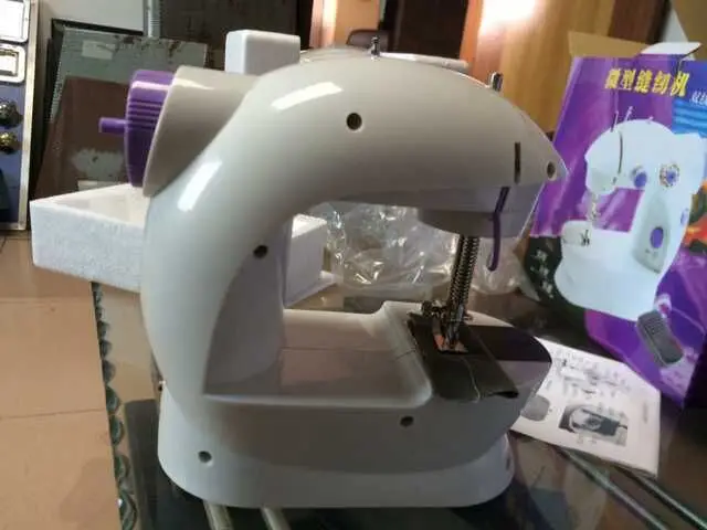 Wholesale Handheld Mini Sewing Machine 202