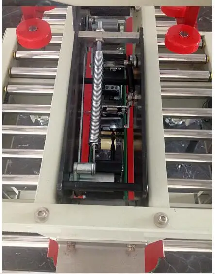 FXJ5050I  Side Drive Belt Semi Automatic Manual Flaps Folding Tape Carton Sealer