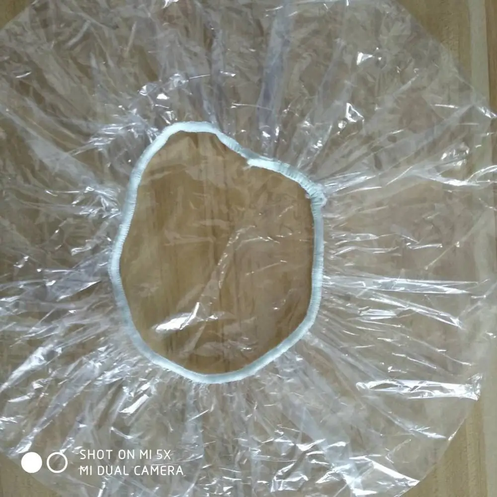 
Disposable Waterproof Plastic Pe Shower Bath Cap Transparent Clear Hotel Bathroom White Strip Clip Head Cover 