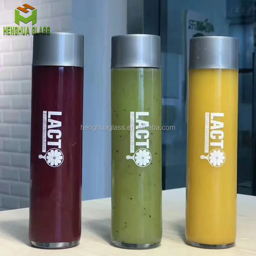 Empty hot sell 400ml 13.5 oz round cylindric glass juice bottle   voss style mineral  water glass bottles with plastic screw cap
