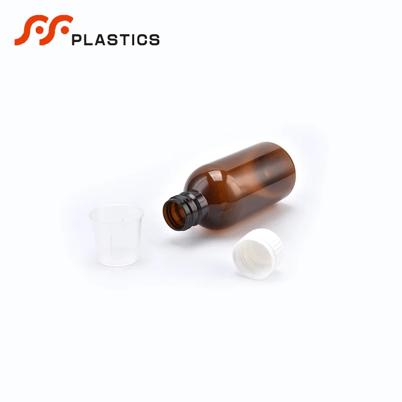 Food grade medical safe seal liquid packaging amber bottle factory wholesale measuring cup cough syrup brown plastic bottle