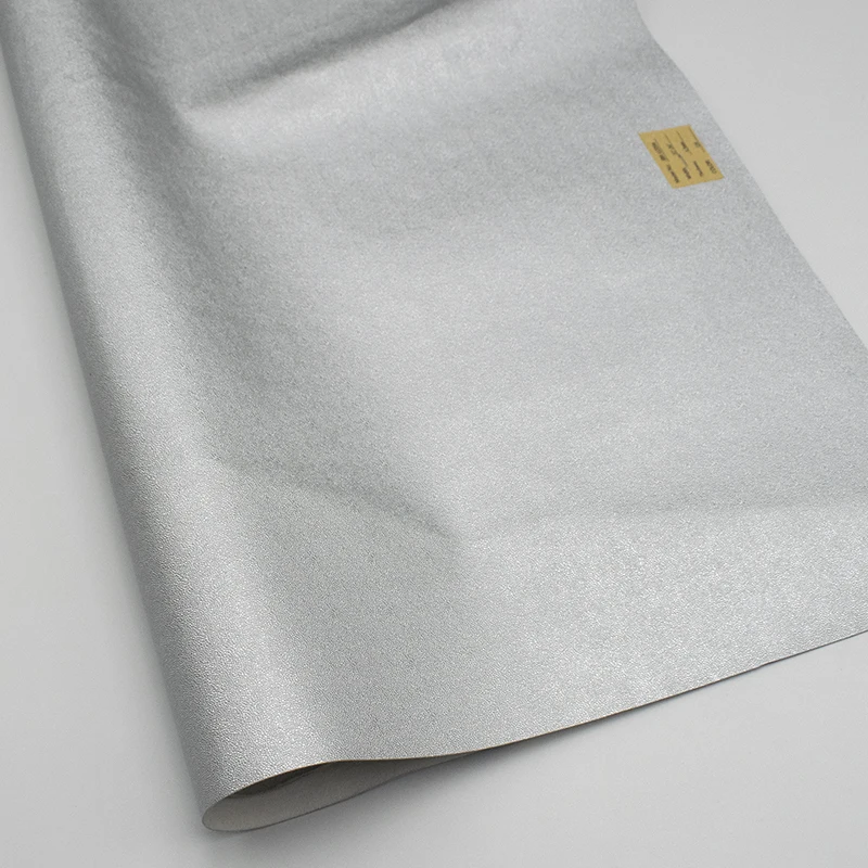 Guangzhou shaped grain embossed pu artificial leather for luggage packaging