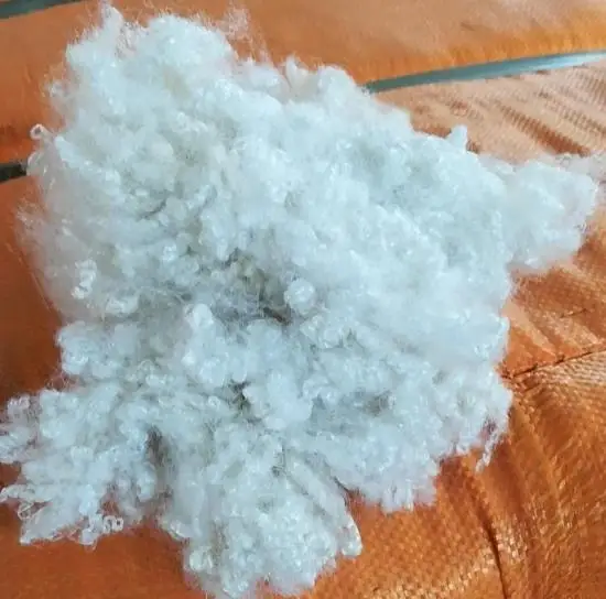 Recycled lowest price 7D*64mm HCS polyester staple fiber Polyester Fiber Manufacturers and Suppliers