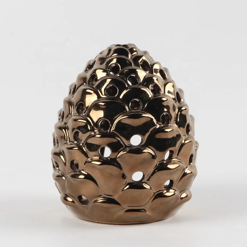 
New arrival pinecone shaped shiny ceramic candle holder for wholesale 