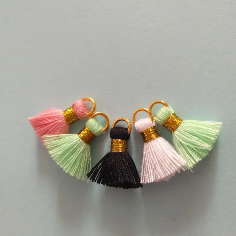 factory custom free sample 700 colors 1.5cm mini cotton tassels for jewelry ,tassel cotton with golden ring