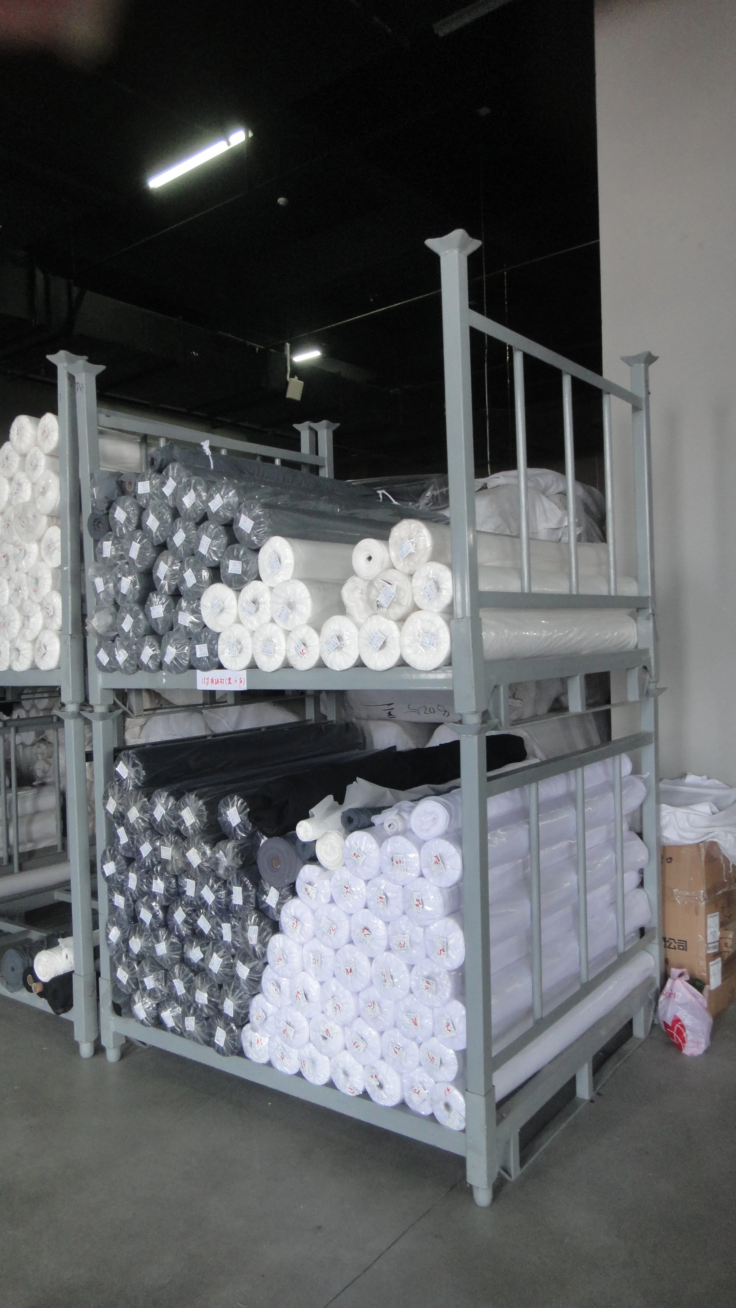 Fabric rolls & carpet stack racks with side frame