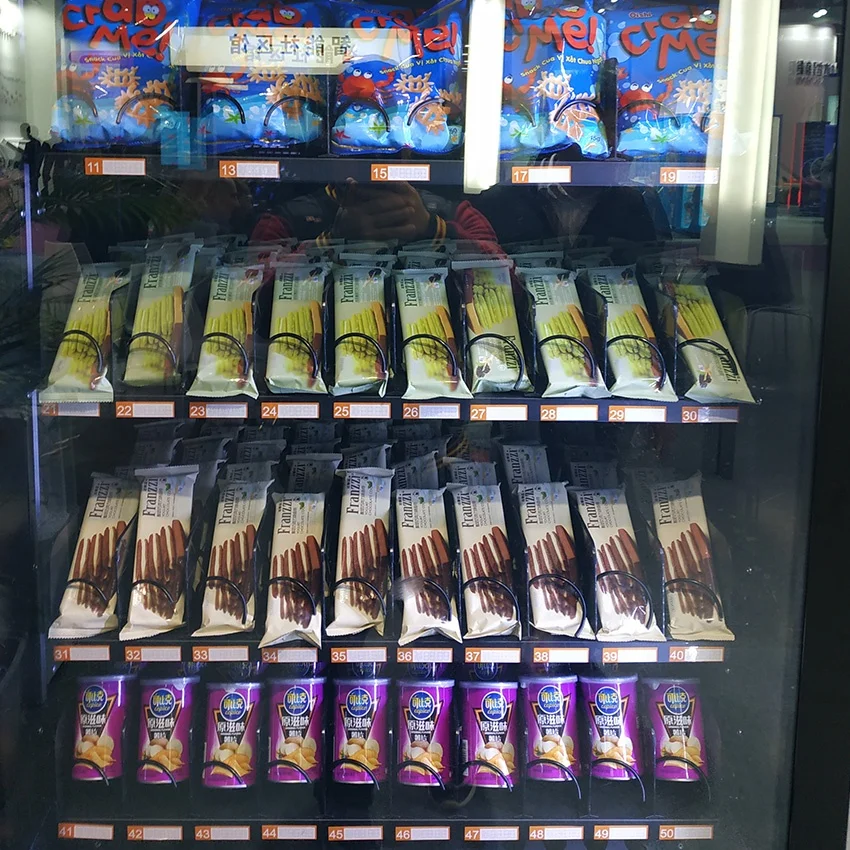 high quality spiral mechanism combo vending machine with advertising screen