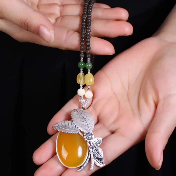 
Kalimantan agilawood beads necklace Thai silver natural canary stone pendant necklace new model necklace 