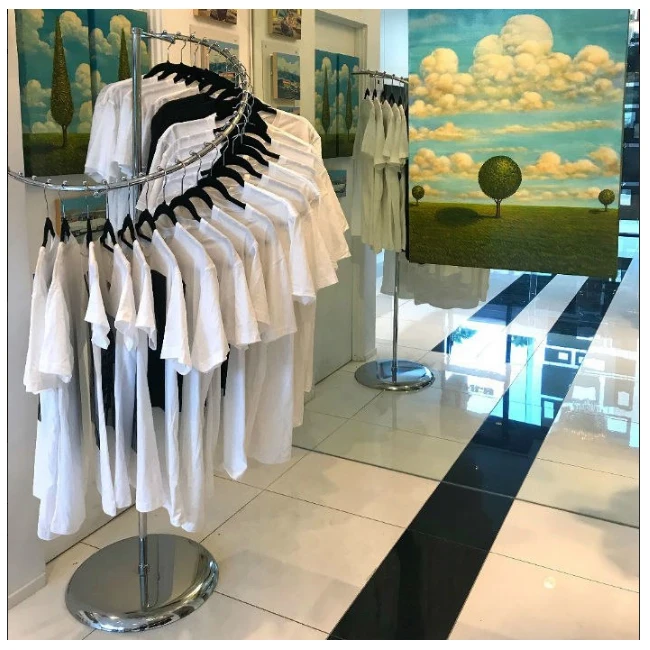 
European style clothing rack for sale round spiral clothing display rack 29 retaining studs chrome finish hotselling online shop 