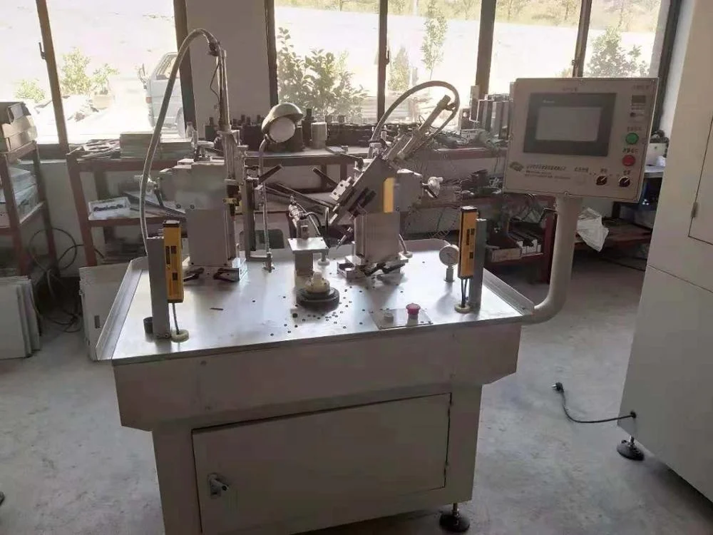 Automatic oil seal and O ring trimming machine
