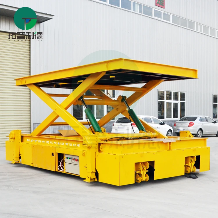 Self-propelled conductor rail powered transfer cart with scissor lift