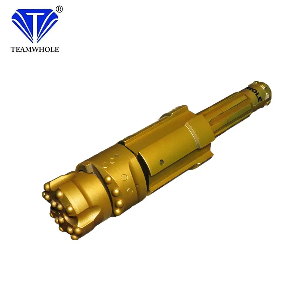 Eccentric overburden casing system with three pieces rock drilling tools
