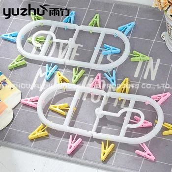 Высокое качество пластик круглой формы вешалка для одежды с 12 зажимы носок снаружи