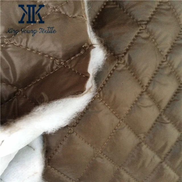 300T oil cire dwr coated nylon taffeta fabric quilted with 120gsm polyester padding for winter coat