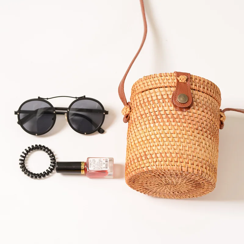 Newest styles popular bucket shape straw rattan handmade shoulder cross-body  summer beach mini braided leather buckle bag
