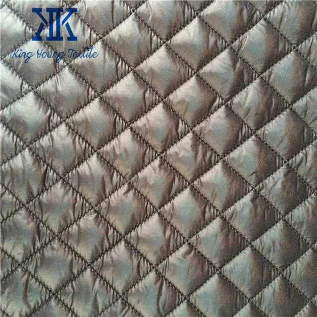 300T oil cire dwr coated nylon taffeta fabric quilted with 120gsm polyester padding for winter coat