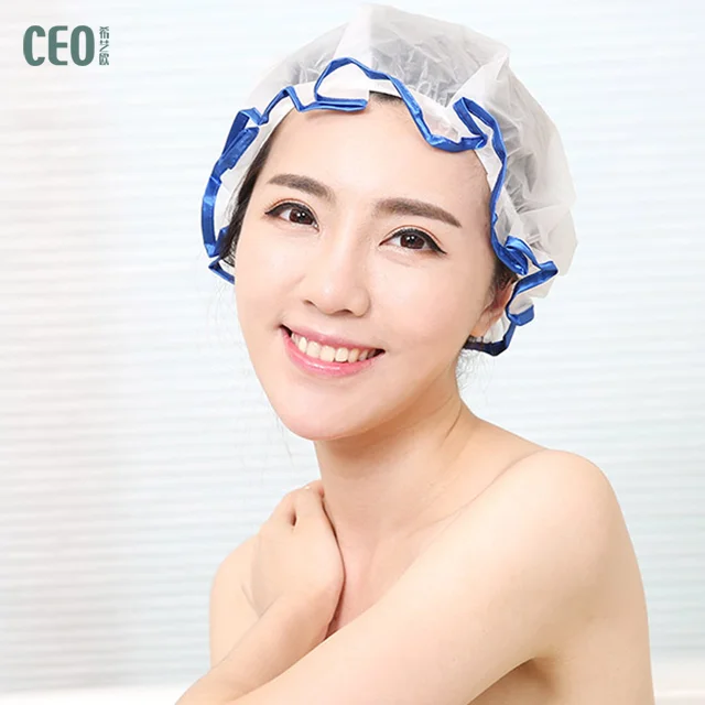 White oversize disposable shower cap with blue and red brim