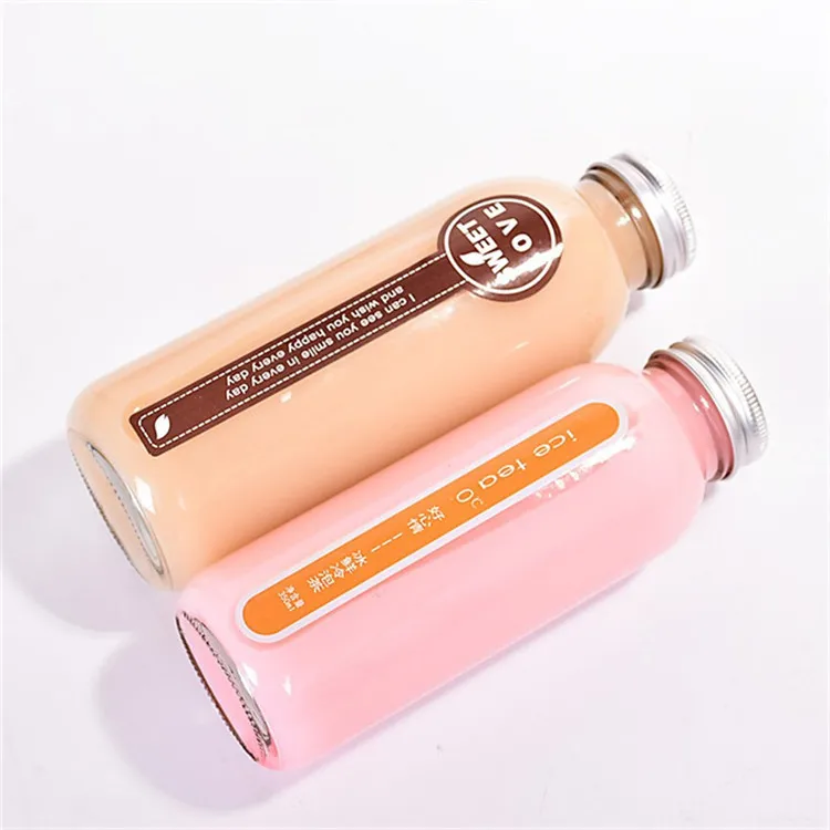 high quality clear epmty 12 oz glass bottles for carbonated drinks with lids