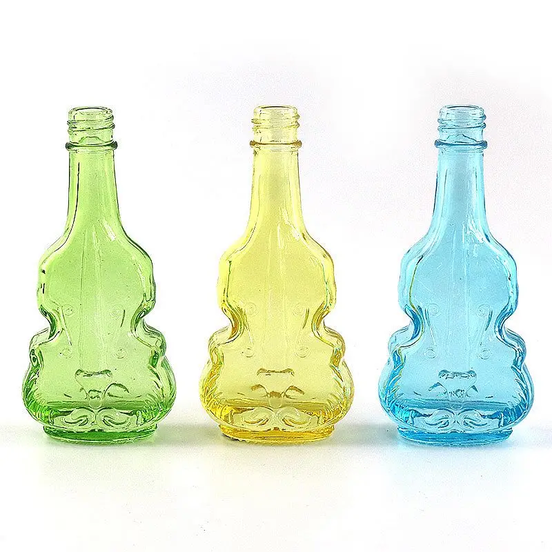 
Creative transparent glass spray bottle, violin perfume bottle Mini spot portable cosmetic packaging sub bottling 