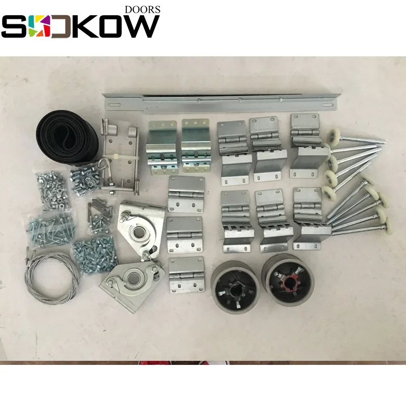 glass sectional door with pesdestrain door