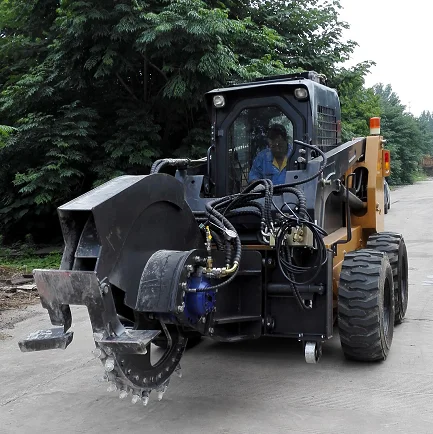 Skid steer loader rock saw trencher
