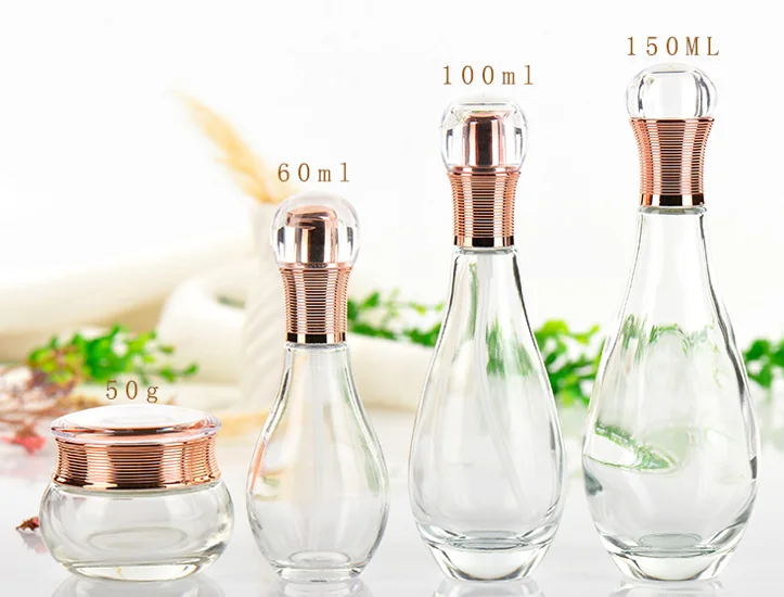 High end free sample 60ml 100ml 150ml bowling ball shape glass lotion bottle with gold pump for body face lotion