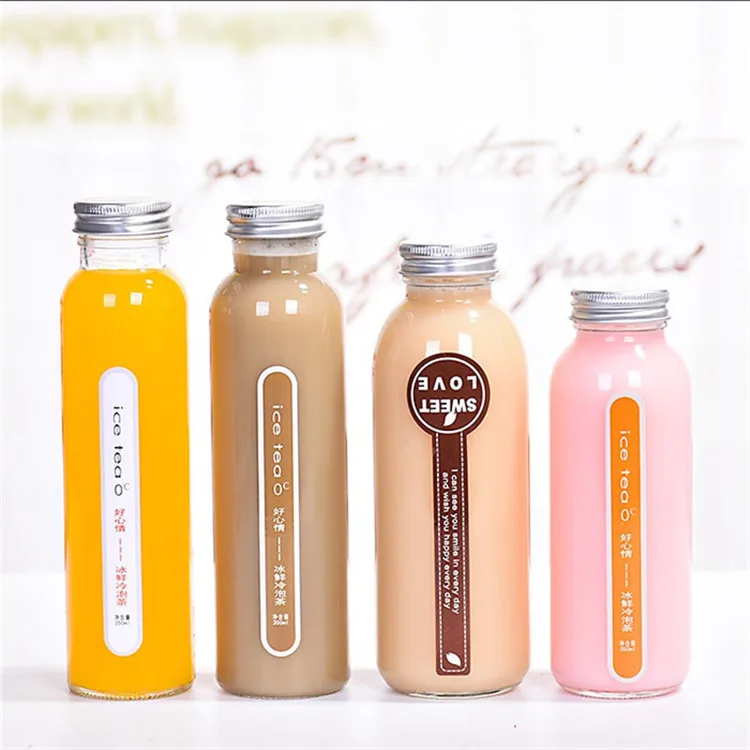 high quality clear epmty 12 oz glass bottles for carbonated drinks with lids